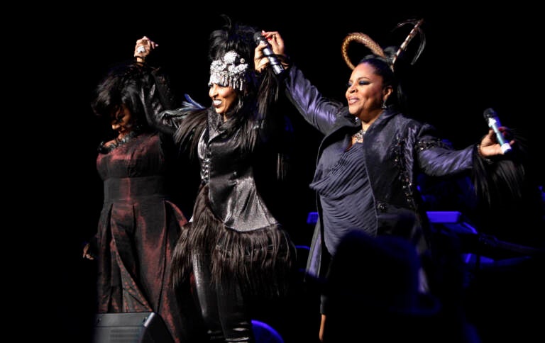 FILE - Patti LaBelle, from left, Nona Hendryx, and Sarah Dash of the group LaBelle greet the crowd during a concert in Los Angeles on Jan. 29, 2009. Dash, who co-founded of the all-female singing group, best known for their raucous 1974 hit “Lady Marmalade,” has died. She was 76. Labelle and Hendryx announced their bandmate's death Monday on social media.  (AP Photo/Matt Sayles, File)