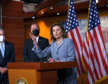 Speaker of the House Nancy Pelosi, D-Calif., joined from left by House Budget Committee Chair John Yarmuth, D-Ky., and House Intelligence Committee Chairman Adam Schiff, D-Calif., talks to reporters about the 