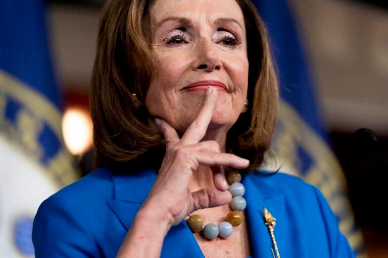 House Speaker Nancy Pelosi of Calif. reacts as she listens to a question from a reporter during her weekly press briefing on Capitol Hill, Thursday, Sept. 30, 2021, in Washington