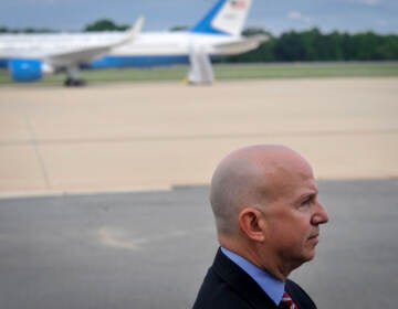 Then-Delaware Gov. Jack Markell awaits the arrival of President Barack Obama on Air Force One at New Castle Air National Guard Base in New Castle, Del., Saturday, June 6, 2015, before attending a funeral for Beau Biden. (AP Photo/Emily Varisco)