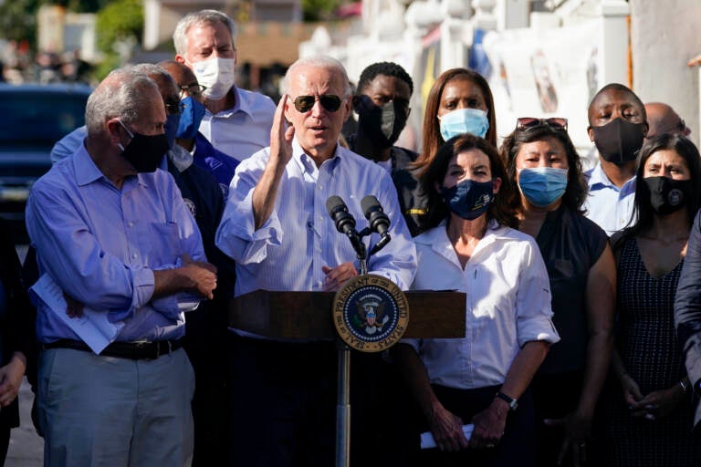 President Joe Biden speaks from a podium in Queens