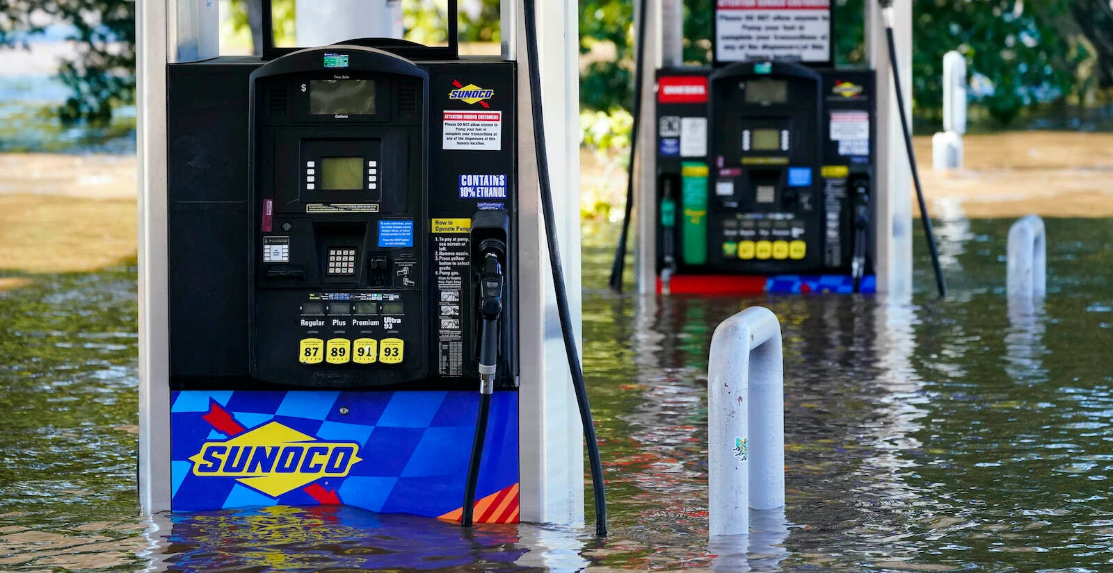 Gas pumps are submerged in water