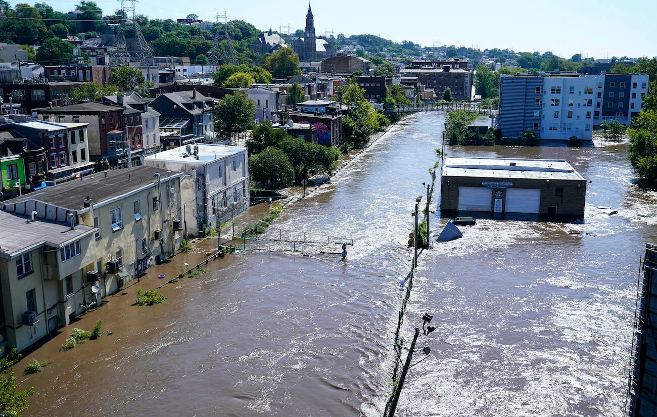 The Schuylkill River exceeds its bank in the Manayunk sectio