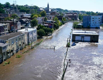 The Schuylkill River exceeds its bank in the Manayunk sectio