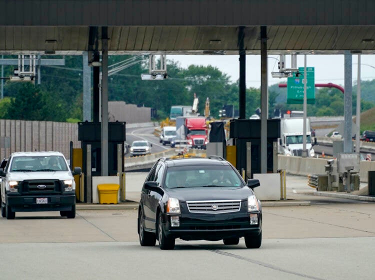 Traffic going eastbound on the Pennsylvania Turnpike proceeds through the electronic toll booths