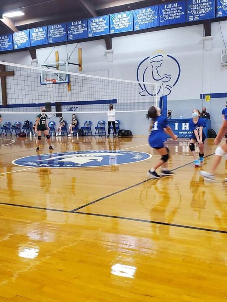 At this recent Immaculate Heart of Mary volleyball game, players, officials and spectators wore masks as required by Gov. Carney's order