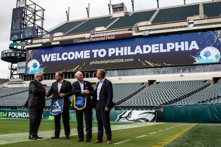 Philadelphia Mayor Jim Kenney posed with delegates from FIFA and United States Soccer at Lincoln Financial Field on September 22, 2021. Philadelphia is a candidate city to host the 2026 World Cup. (Kimberly Paynter/WHYY)