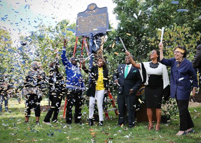 A historical marker celebrating the life of broadcaster Ed Bradley is unveiled at Fairmount Park West. Bradley’s wife, Patricia Blanchet (second from right) was in attendance along with city and state officials