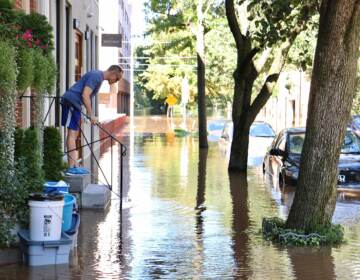 Water rises on Race Street near the Schuylkill River.