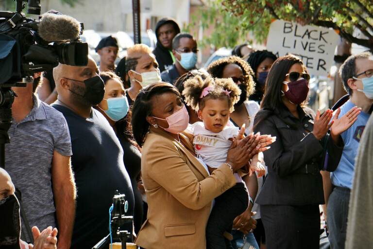 A crowd gathers outside Chester police headquarters, where the family of Bahir Green held a press conference to demand answers about the 16-year-old’s arrest. A video appeared to show Chester police beating the boy after he surrendered. (Emma Lee/WHYY)