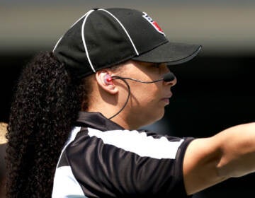 Line judge Maia Chaka #100 signals during the game between the Carolina Panthers and the New York Jets at Bank of America Stadium on September 12, 2021 in Charlotte, North Carolina. (Photo by Grant Halverson/Getty Images)