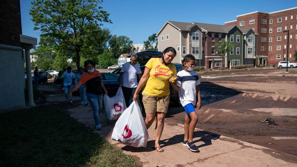 People evacuate after flooding.