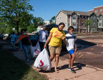 People evacuate after flooding.