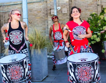 Members of Batalá Philly play the drums