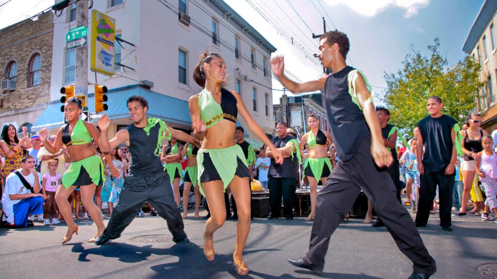 Dancers perform during Feria del Barrio