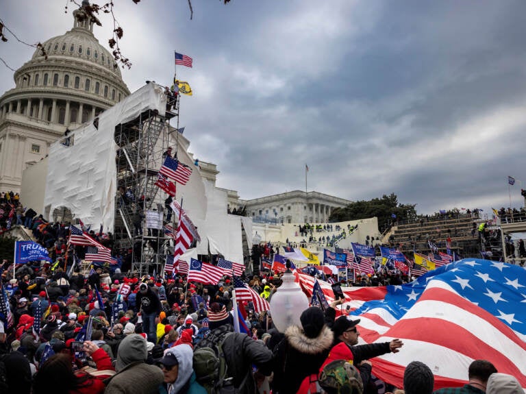 Trump supporters clash with police and security forces as people try to storm the US Capitol on January 6, 2021 in Washington, DC