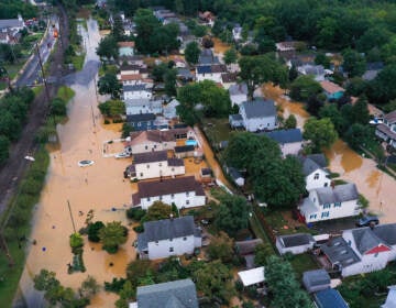 An aerial view of flooded streets are seen in Helmetta