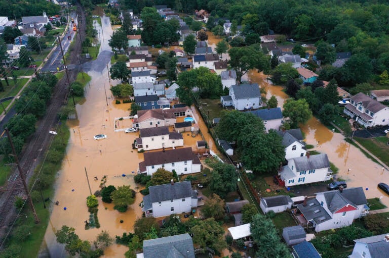 An aerial view of flooded streets are seen in Helmetta