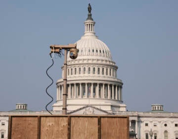 A recently installed surveillance camera is positioned near the U.S. Capitol on Monday. (Anna Moneymaker/Getty Images)