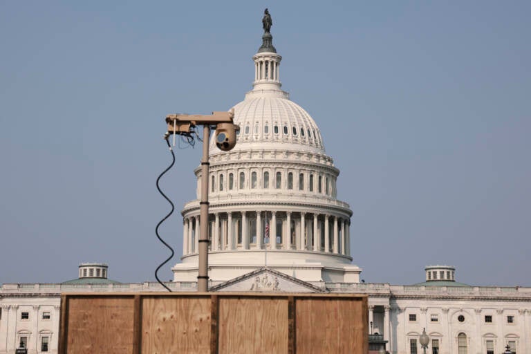 A recently installed surveillance camera is positioned near the U.S. Capitol on Monday. (Anna Moneymaker/Getty Images)