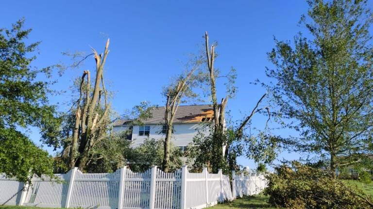 A home is seen with major damage in Mullica Hill