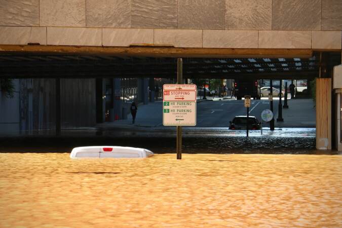 22nd Street under the JFK Boulevard is swamped as the Schuylkill River rises