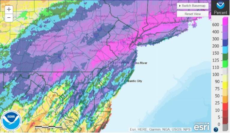 A forecast map shows a line of storms expected to hit the Philly area