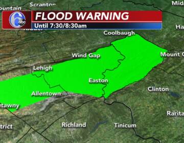 A weather map shows a flood warning in effect