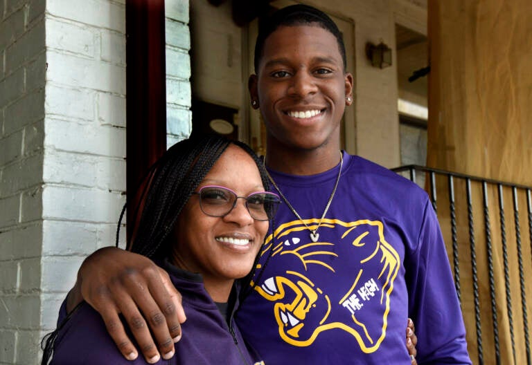 Danielle Carter and her son Vance Carter outside their Camden home