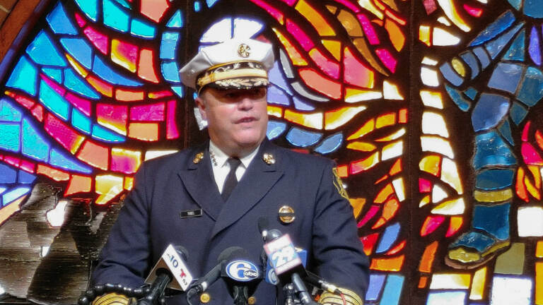 Fire Commissioner Adam Thiel speaks at a press conference