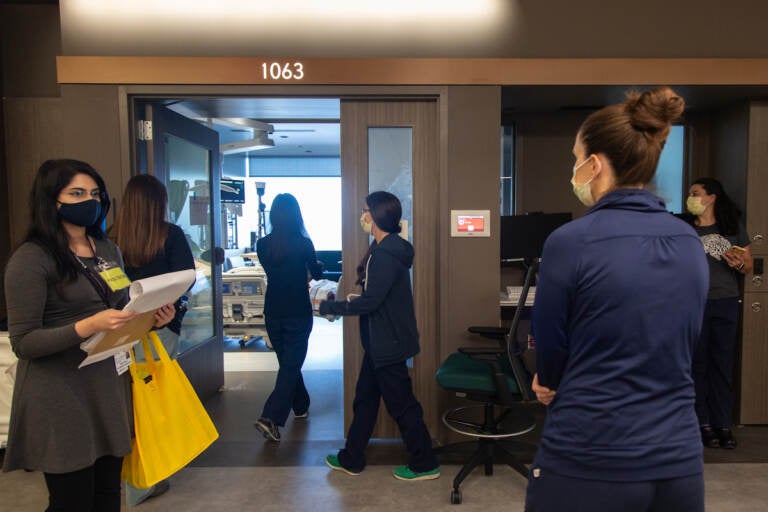 A team of medical professionals rehearse different scenarios in the new patient rooms at the new Pavilion building at the Hospital of the University of Pennsylvania