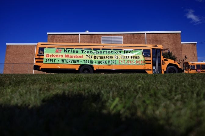 A school buses is pictured outside a school