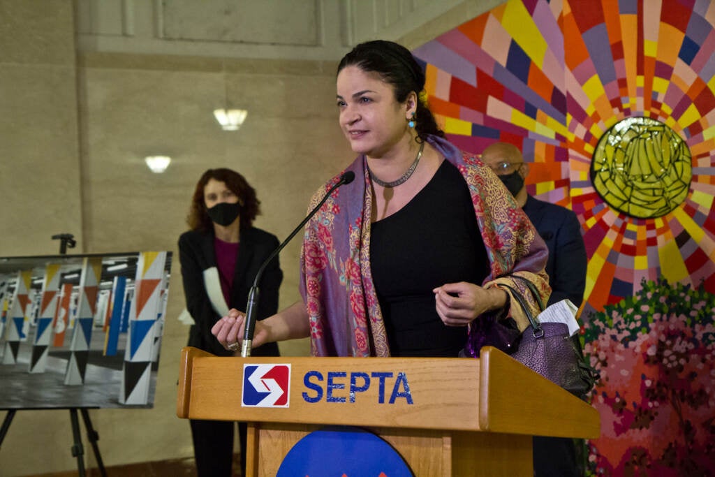 Mosaic Artist Ellen Tiberino speaks at the dedication of the Opposing Forces mural at Suburban Station in Philadelphia on October 7, 2021