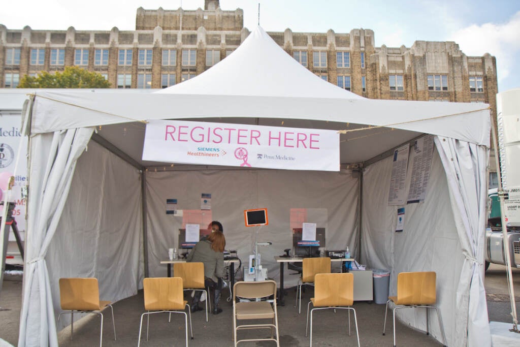 A patient registers for a free breast cancer screening at Penn Medicine’s mobile unit in North Philadelphia on Oct. 22, 2021