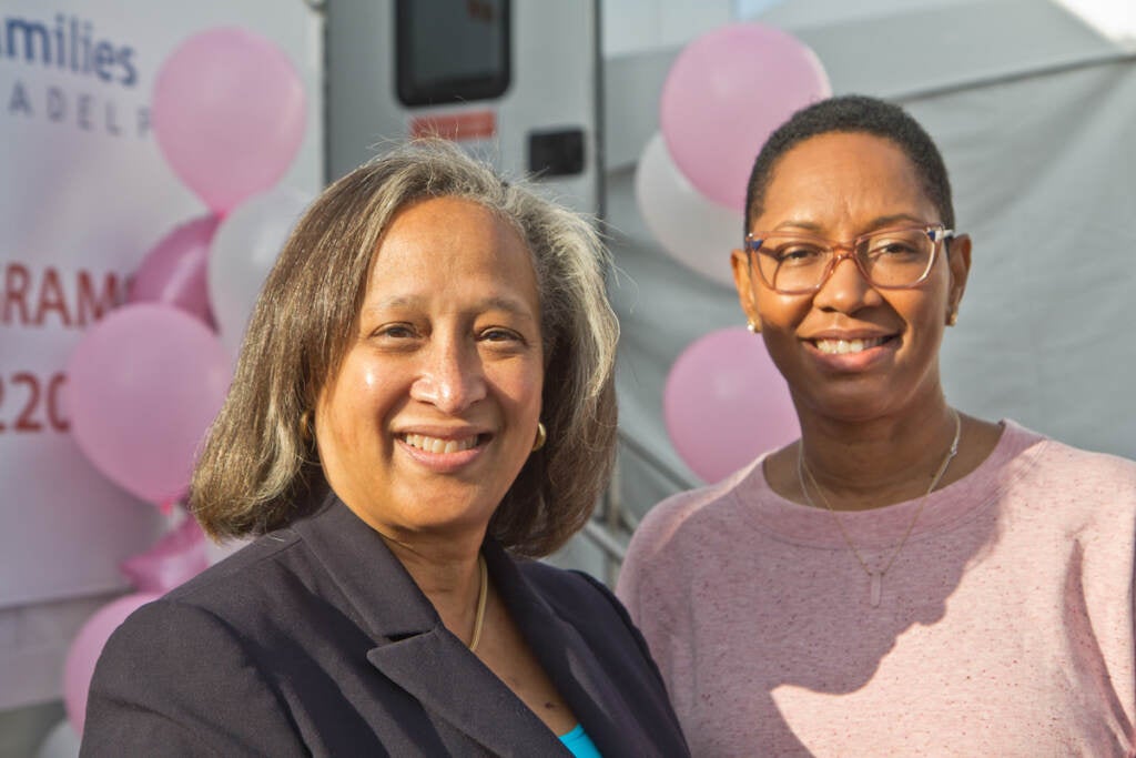 Dr. Linda Nunes (left) with Dr. DaCarla Albright (right) at Penn Medicine’s mobile mammography unit in a North Philadelphia parking lot on Oct. 22, 2021