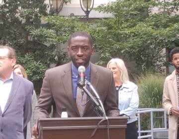 Councilmember Isaiah Thomas calls for people to register to vote at a rally on Monday, October 11, 2021. (Tom MacDonald WHYY)