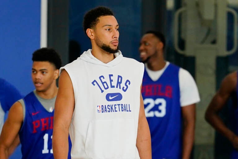 Ben Simmons stands during a Sixers practice