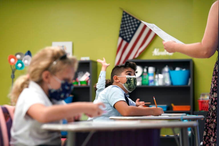 A a student listens to the teacher's instructions at iPrep Academy