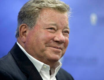 FILE - In this May 6, 2018 file photo, actor William Shatner takes questions from reporters after delivering the commencement address at New England Institute of Technology graduation ceremonies, in Providence, R.I.