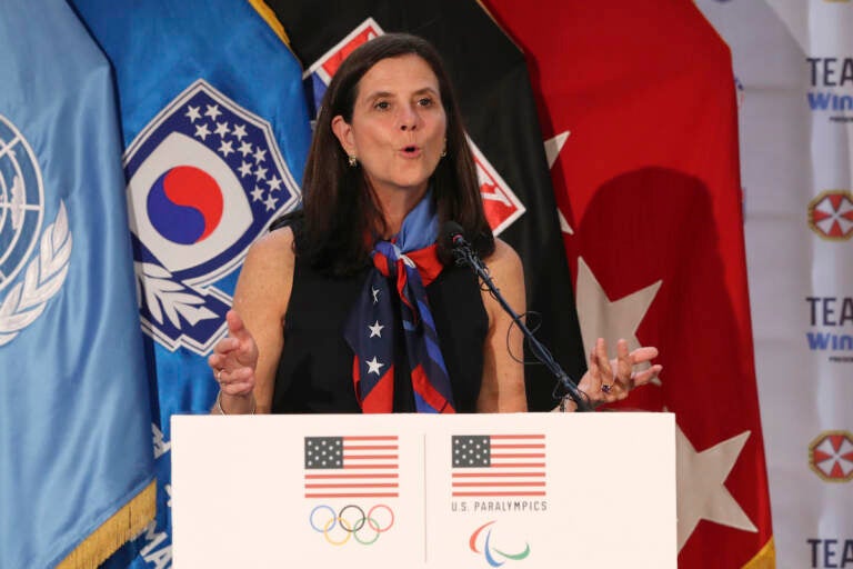 In this Aug. 1, 2017, file photo, U.S. Olympic Committee chief marketing officer Lisa Baird speaks about the Team USA WinterFest for the upcoming 2018 Pyeongchang Winter Olympic Games, at Yongsan Garrison, a U.S. military base in Seoul, South Korea
