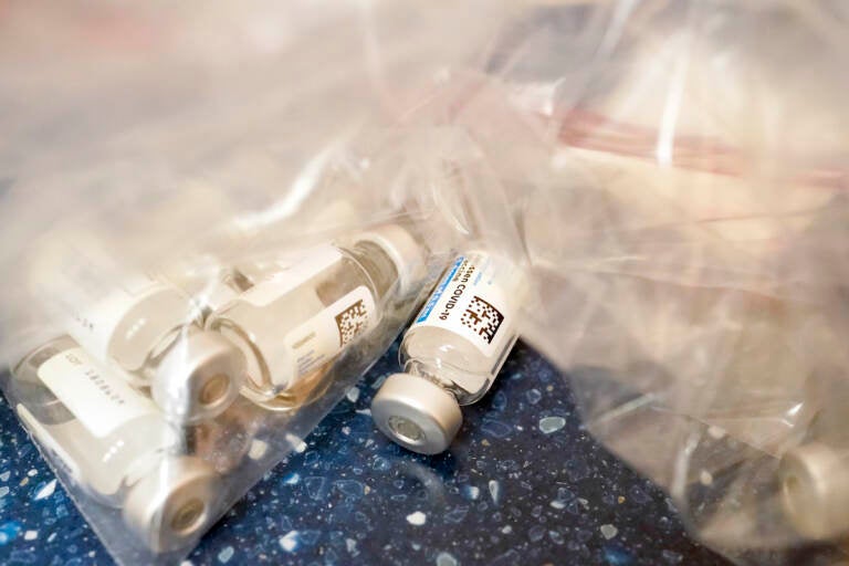 Empty vials of the Johnson & Johnson's one-dose COVID-19 vaccine are seen at the Vaxmobile, at the Uniondale Hempstead Senior Center, Wednesday, March 31, 2021, in Uniondale, N.Y.