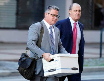 Philadelphia City Councilmember Bobby Henon, left, accompanied by his attorney Brian Mcmonagle, walk to the federal courthouse in Philadelphia, Wednesday, Oct. 27, 2021