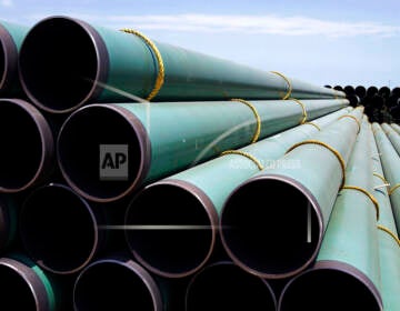 In this May 15, 2011 photo, hundreds of drilling pipes are stacked at a rail center in Gardendale, Texas. (AP Photo/Pat Sullivan, File)