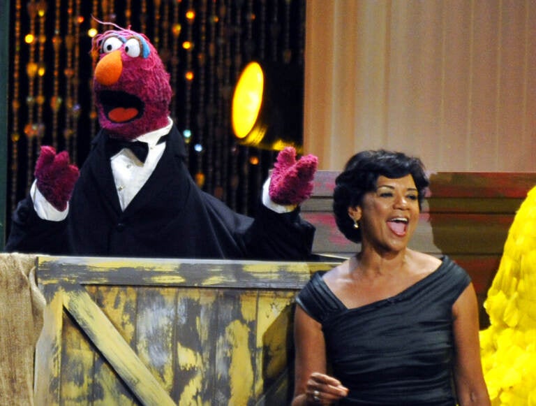 FILE - In this Aug. 30, 2009 file photo, actress Sonia Manzano, right, performs at the Daytime Emmy Awards in Los Angeles. Manzano, who has played the role of Maria on the groundbreaking kid show 