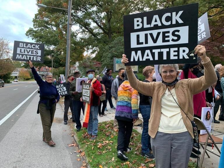 People gathered for a vigil for Walter Wallace Jr. at the Germantown Unitarian Society in Philadelphia