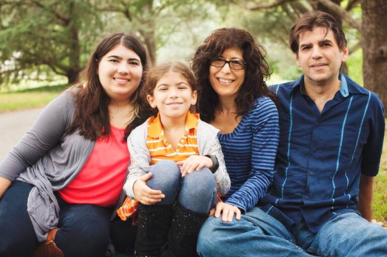 Delaware resident, Marianne Sarcich (third from left) with her husband and children weeks before her mastectomy. (Della Schweiger)