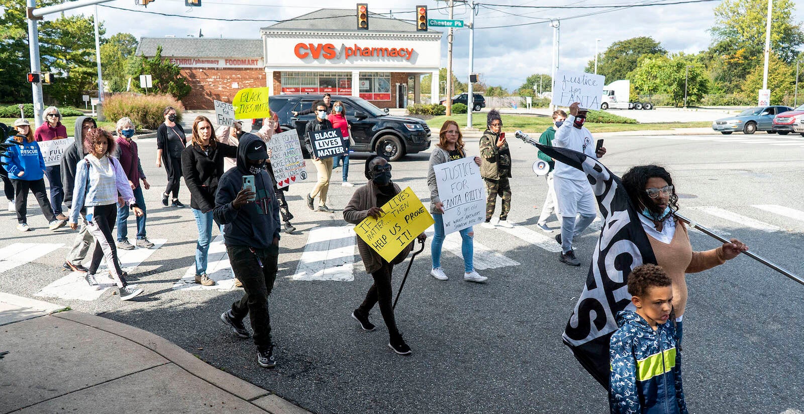 The Justice for Fanta Bility silent march in Sharon Hill, PA on 10/17/21. Fanta Bility was an eight year old girl who was shot and killed outside of a football game at Academy Park High School on August 27, 2021. The march had been organized and  led by the UDTJ and Delco Resists as a way to honor Fanta’s life as well as call for police accountability. 
[DANIELLA HEMINGHAUS]