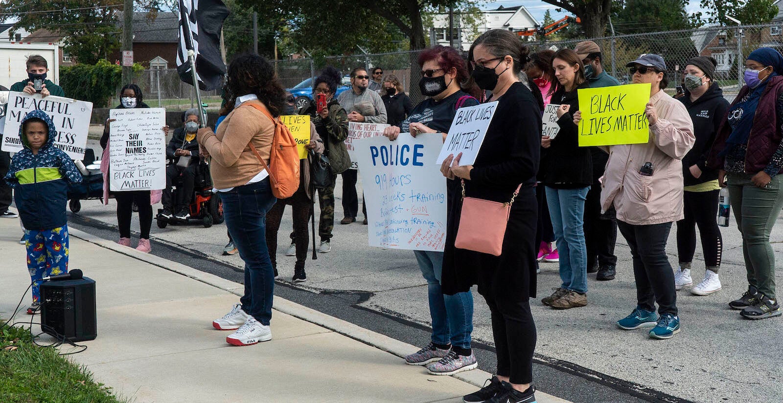 The group stopped outside of the Academy Park High School football stadium for eight minutes of silence. 
The Justice for Fanta Bility silent march in Sharon Hill, PA on 10/17/21. Fanta Bility was an eight year old girl who was shot and killed outside of a football game at Academy Park High School on August 27, 2021. The march had been organized and  led by the UDTJ and Delco Resists as a way to honor Fanta’s life as well as call for police accountability. 
[DANIELLA HEMINGHAUS]