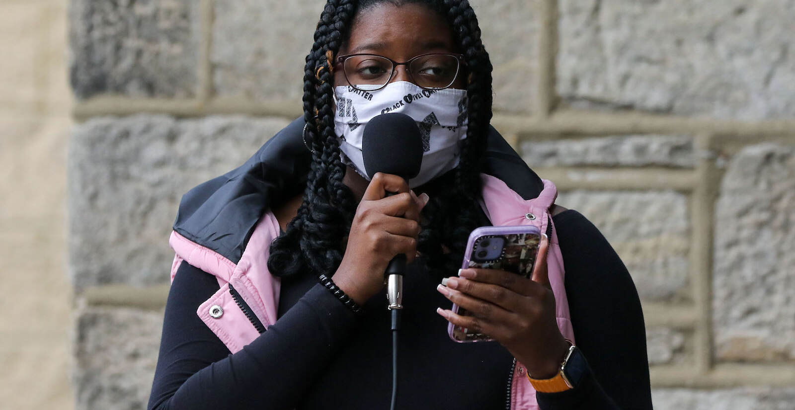 Dyamond Gibbs, from the UDTJ organization, speaking to the group.
The Justice for Fanta Bility silent march in Sharon Hill, PA on 10/17/21. Fanta Bility was an eight year old girl who was shot and killed outside of a football game at Academy Park High School on August 27, 2021. The march had been organized and  led by the UDTJ and Delco Resists as a way to honor Fanta’s life as well as call for police accountability. 
[DANIELLA HEMINGHAUS]