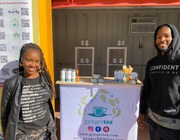 Felicia Harris-Williams and husband Craig Williams own Gynger Tea, one of the 50 vendors participating in the LOVE Park pop-up market. (Aaron Moselle/WHYY)